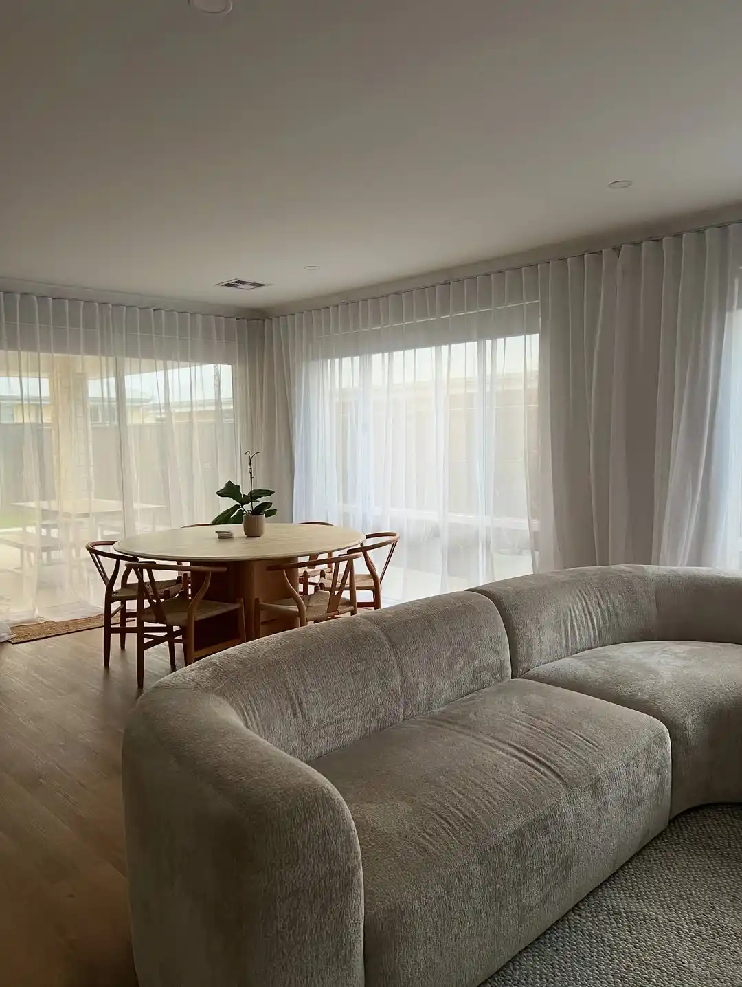 10 DIY Minimalist Living Room Decor Ideas You Can Make for Under $30 9 DIY sheer curtains