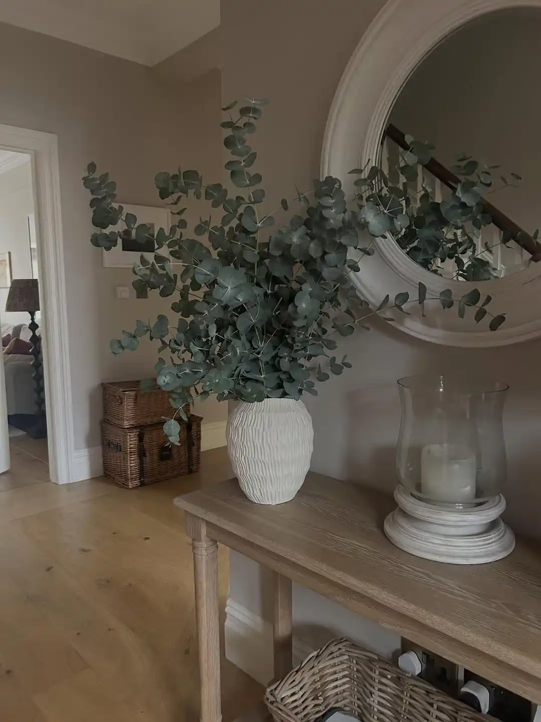 10 Minimalist Living Room Refresh Ideas for Spring That Take Less Than a Weekend 8 eucalyptus stem decor