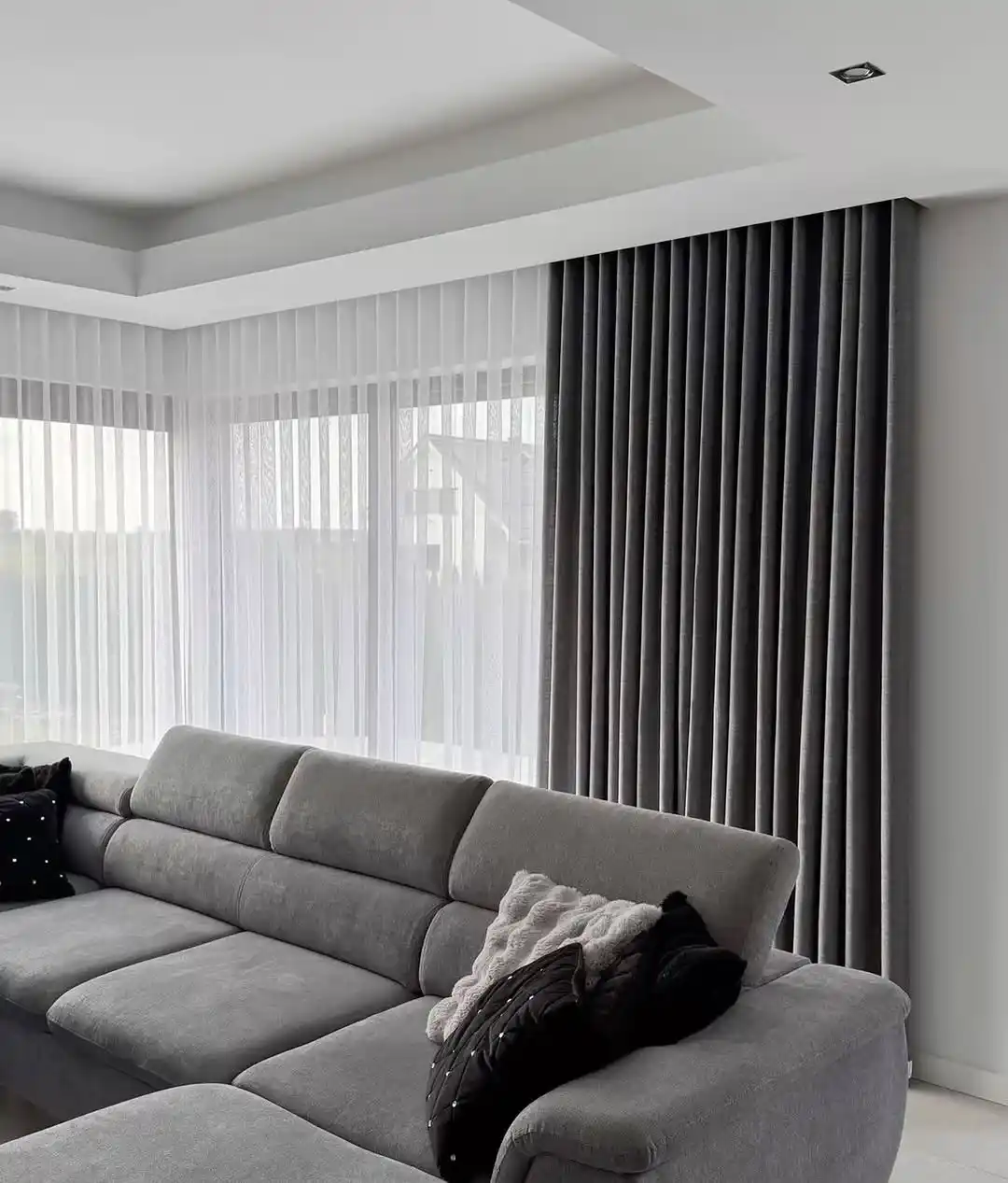 15 Curtain Ideas for Small Living Rooms That Add Height and Light 3 gray curtains living room