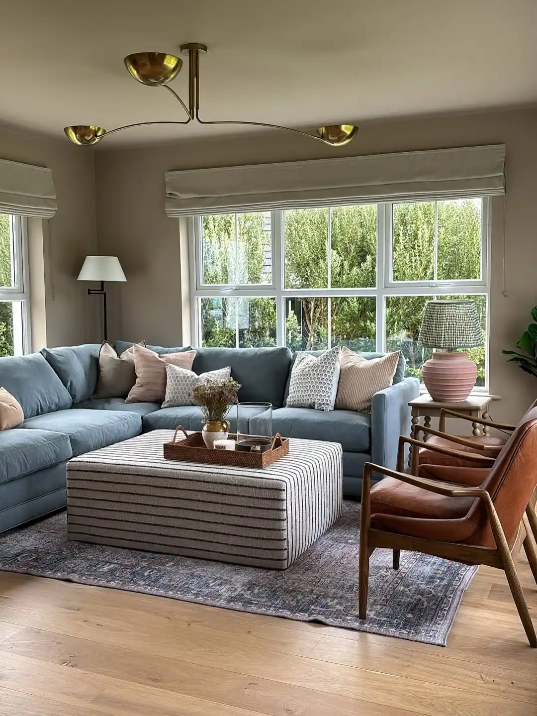 Summer Living Room Refresh: 10 Light and Airy Ideas for 2026 5 ocean blue sofa
