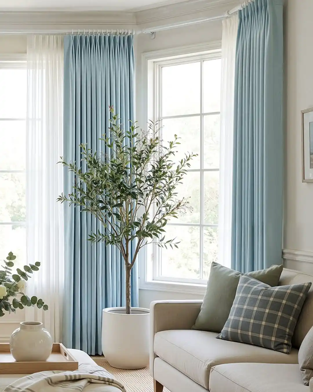 15 Curtain Ideas for Small Living Rooms That Add Height and Light 8 powder blue curtains living room